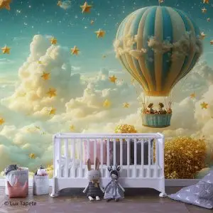 White baby crib with plush toys in a nursery, set before a whimsical mural of a teal hot-air balloon, clouds, and gold stars.